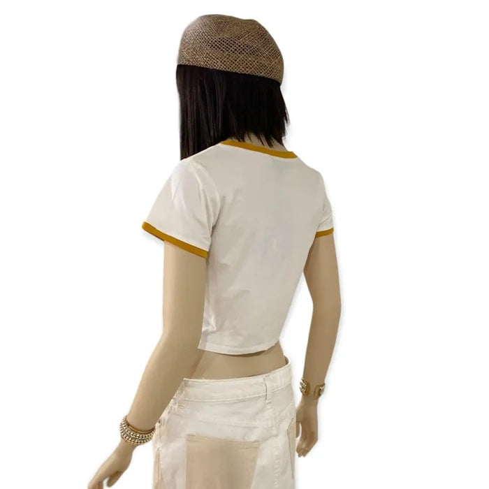 loyal lioness short sleeve graphic leo baby tee with sunburst lion print white crop top with tan contrast trim