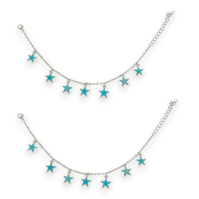 Silver glow stars anklets set featuring dangling celestial charms, glowing blue stars, adjustable silver chain anklets for festival, rave, and beach outfits