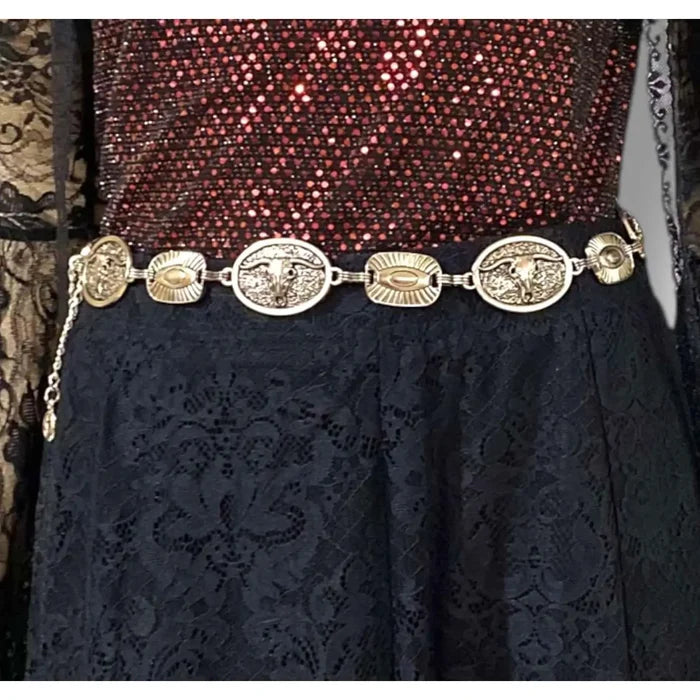 Western cow skull coin link belt with engraved oval links, perfect for festival fashion