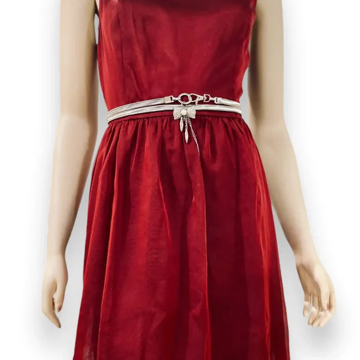 silver crystal bow ring waist belt on model over satin dress