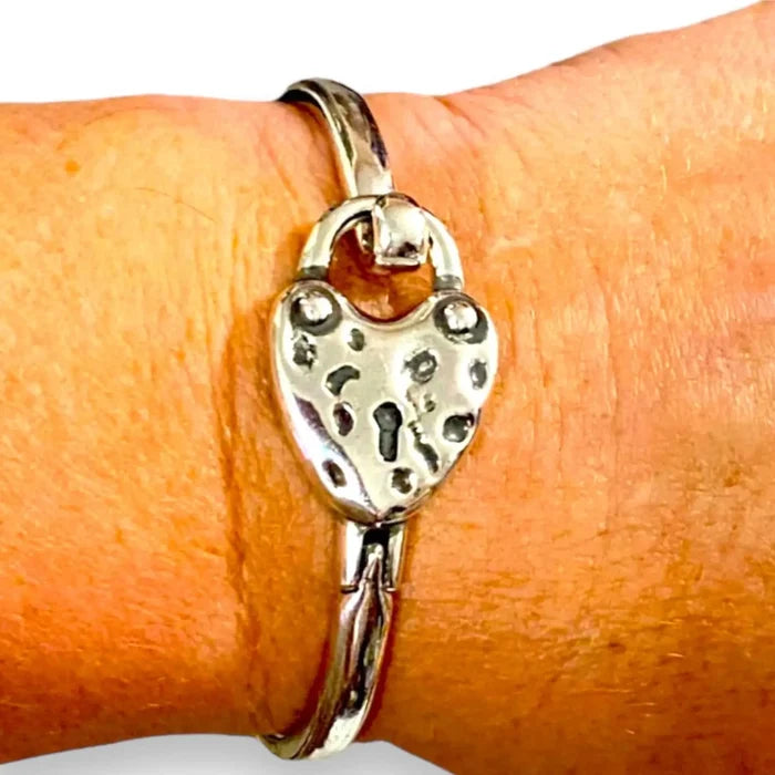 Silver Heart Hammered Bangle Bracelet  hammered heart centerpiece and spring tension closure