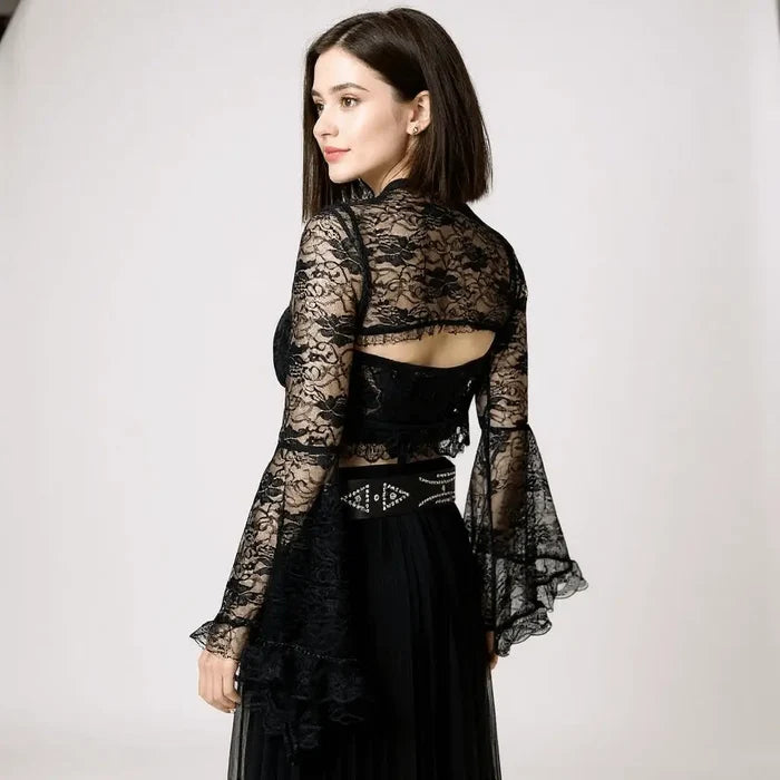 Silver studded oversize buckle wide belt with tribal rivets and wide faux leather strap woman wearing black back view