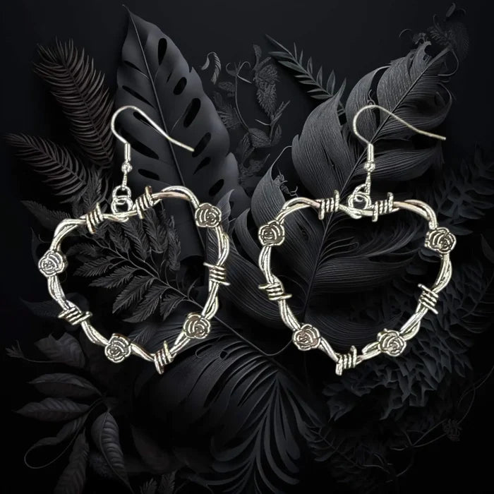 silver thorn floral open heart dangle earrings with barbed wire style edges and fish hook closure gothic boho y2k jewelry