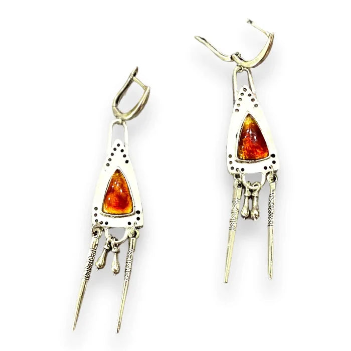 Silver Triangle Chandelier Earrings with orange glass resin center, dangling silver fringe charms, boho western and tribal statement jewelry