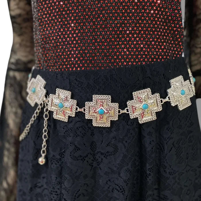 Silver turquoise cross western chain belt with textured cross medallion links and green faux turquoise centers, adjustable clasp closure, worn at waist or hips.