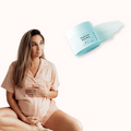 Sleepybelly Comfort Bundle: mum-to-be in peach maternity pyjamas with Magnesium Body Balm tub