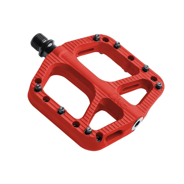 Red bicycle pedal with a white background