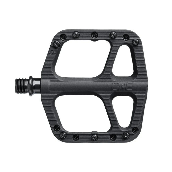Black bicycle pedal with 'ONE' branding on a white background
