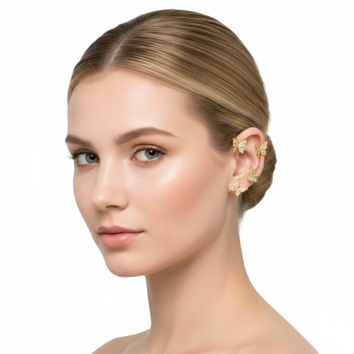 Woman wearing the gold Sparkle Butterfly Ear Cuff Wrap Set Earrings with non-pierced cuffs and glittery wings women's/ osfm
