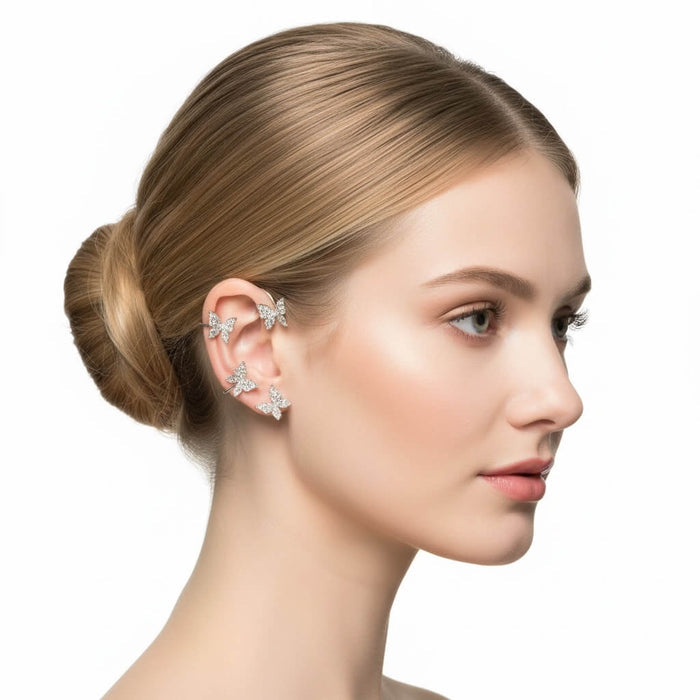 woman wearing right ear Sparkle Butterfly Ear Cuff Wrap Set Earrings with non-pierced cuffs and glittery wings women's / osfm