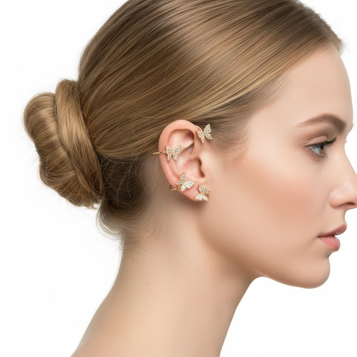 woman wearing right ear Sparkle Butterfly Ear Cuff Wrap Set Earrings with non-pierced cuffs and glittery wings women's / osfm