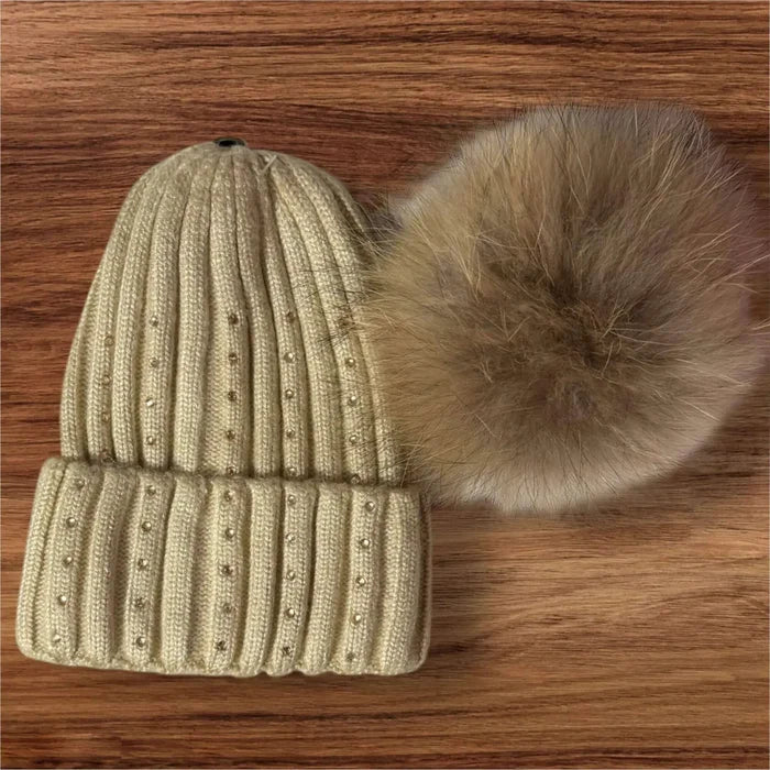 Sparkly beige rib knit cuffed beanie with detachable raccoon fur pom pom and champagne crystal accents, soft wool acrylic winter hat.
