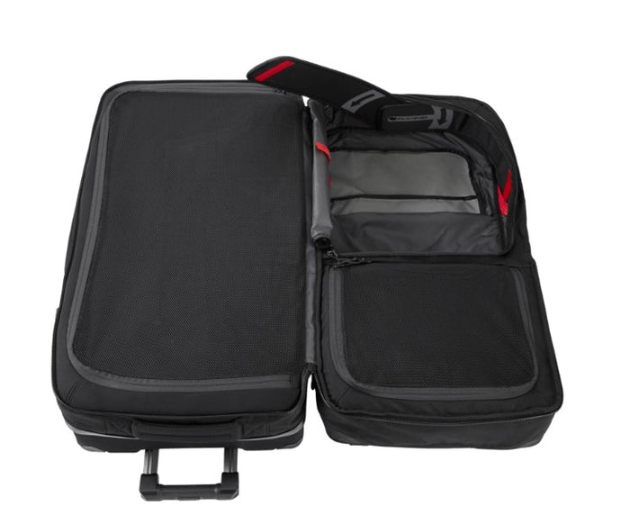 Black suitcase with a smaller black bag inside on a white background