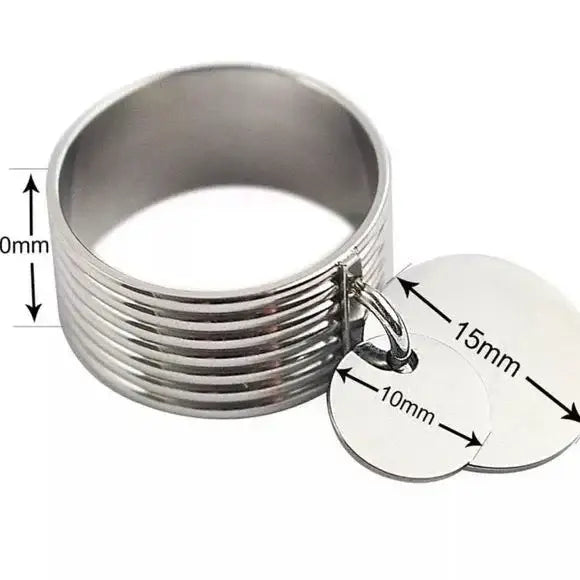 Stainless Steel Coin Charm Wide Band Ring in silver with rivet-textured band and two dangling coin charms flay lay 10.25