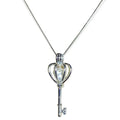 Sterling silver heart crown skeleton key pendant with faux pearl on dainty chain – necklace flat lay on neutral background