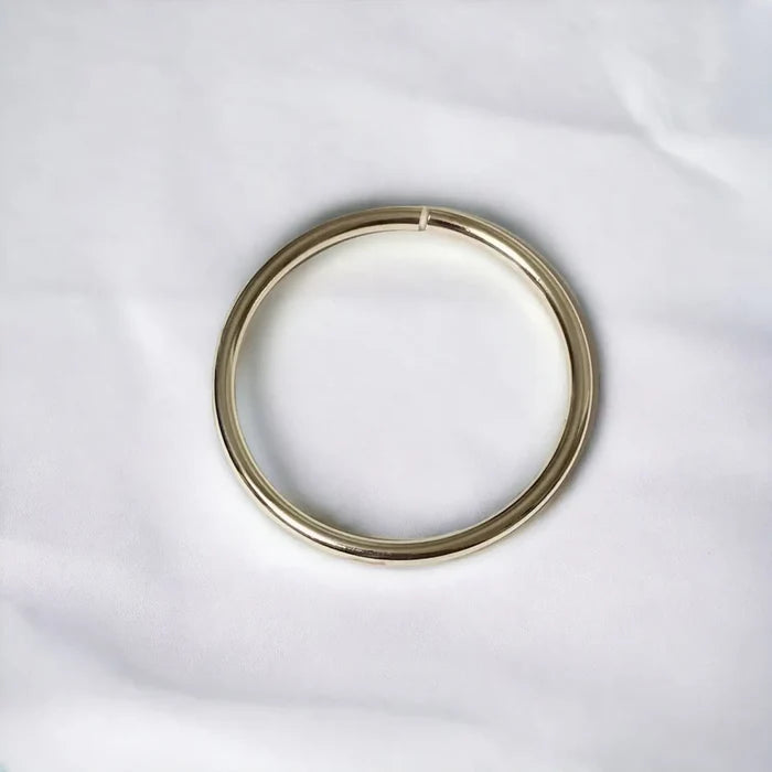 Single item flat lay Sterling Silver Split Round Bangle