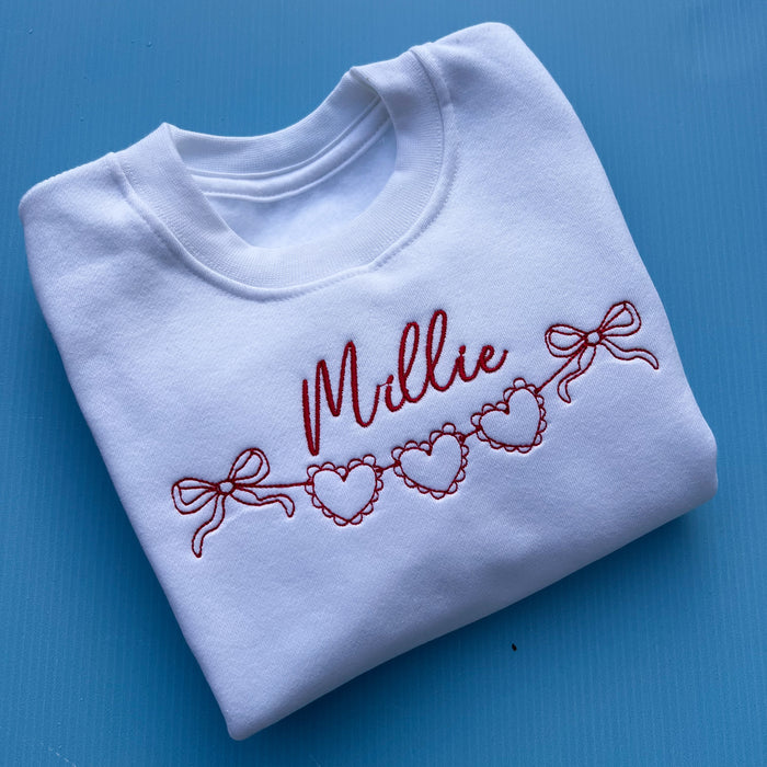 White string of hearts design sweatshirt
