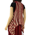 Striped western knitted fringe vest in ivory and red with sleeveless open front, tribal diamond back design, and asymmetrical high-low tassel hem, size S/M