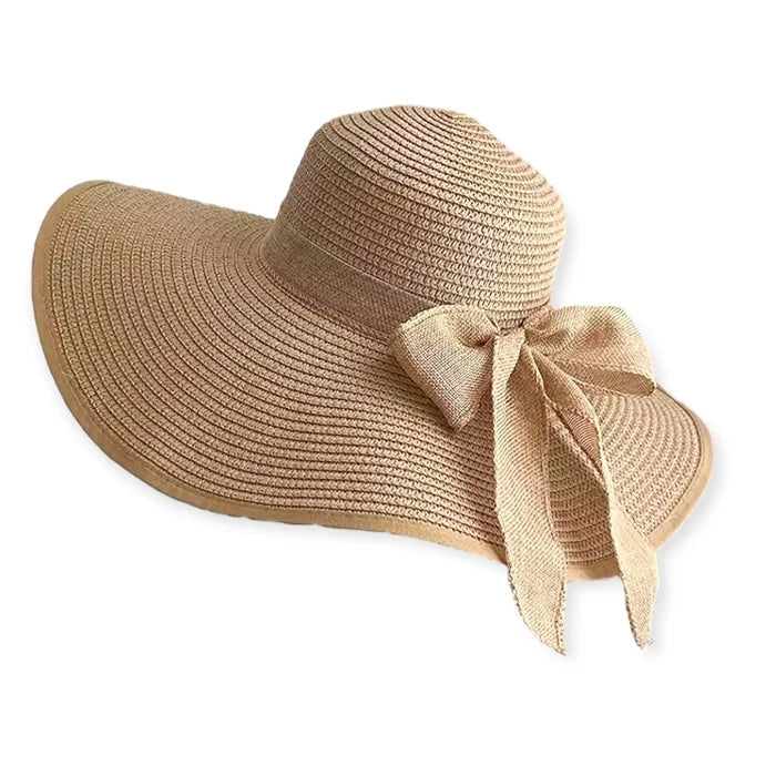 Summer wide brim straw sun hat with linen bow and UPF 50+ protection, perfect for boho chic beach style.