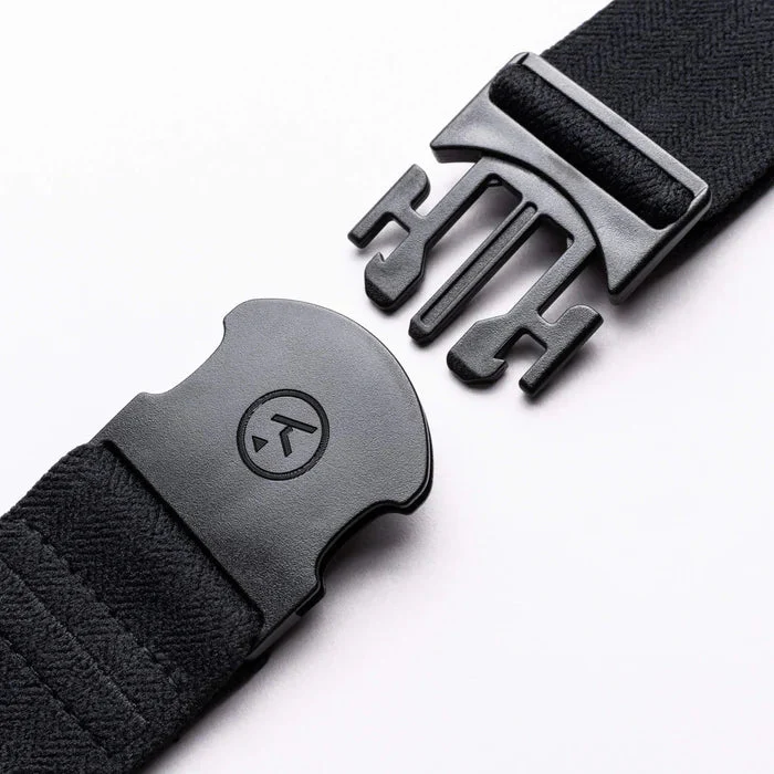 Black belt with a metallic buckle on a white background
