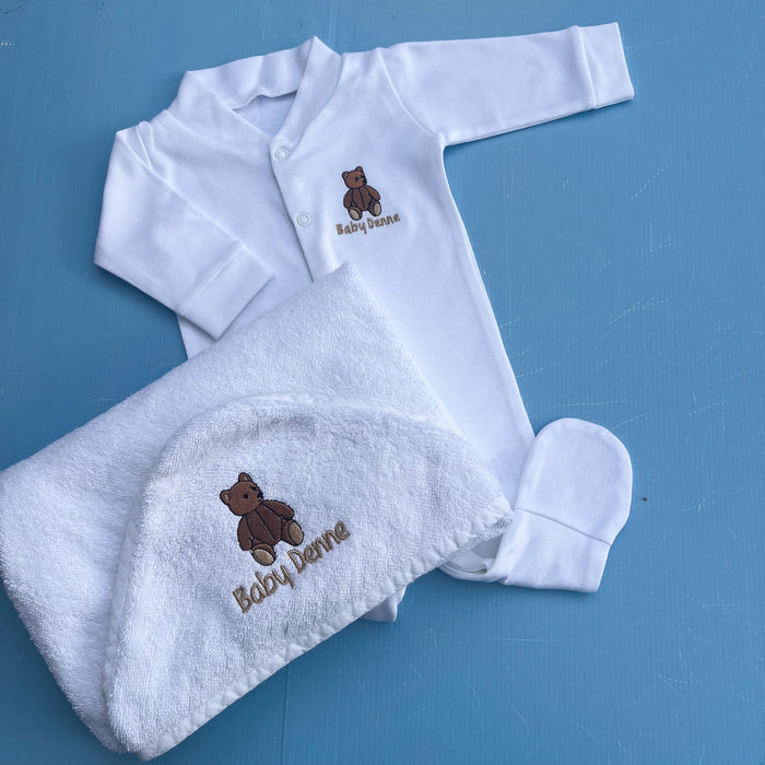 Baby clothing set with white babygrow and feel with a traditional bear embroidery