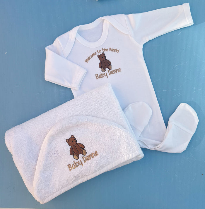 Baby clothing set with white babygrow and feel with a traditional bear embroidery