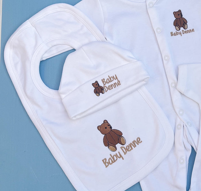 Close up of baby Bob and hat with traditional bear embroidery