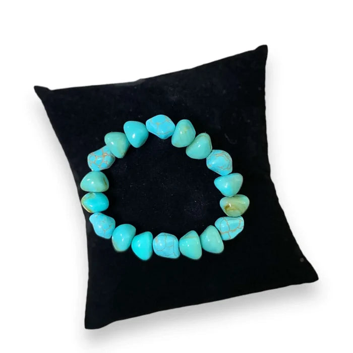 women's turquoise beaded stacked elastic bracelet with faux turquoise nuggets faux pearls and silver spacer beads stretchy fit handcrafted in USA boho western jewelry