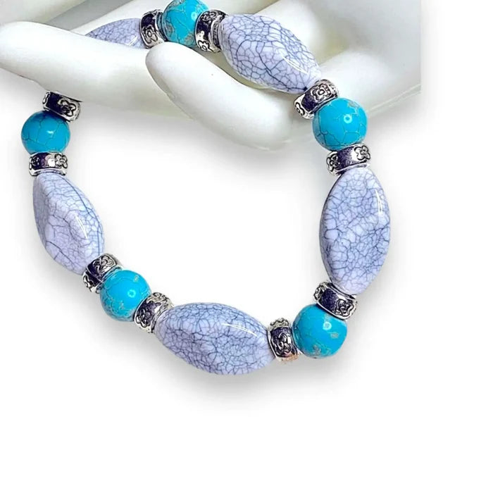 women's turquoise beaded stacked elastic bracelet with faux turquoise nuggets faux pearls and silver spacer beads stretchy fit handcrafted in USA boho western jewelry