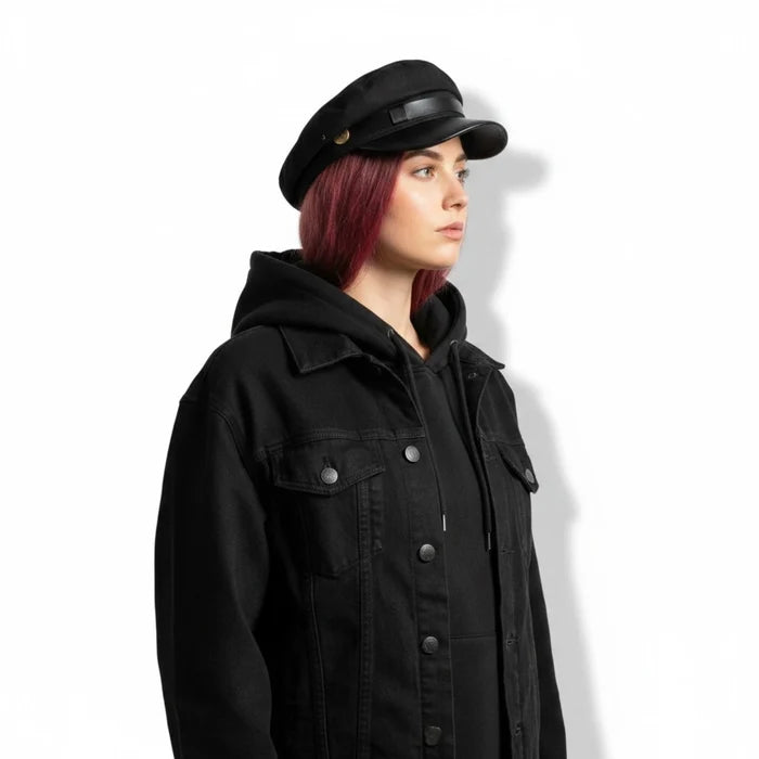 model wearing Two Tone Cotton Flat Top Fisherman Cap black faux leather curved brim, and gold button band in black / one size