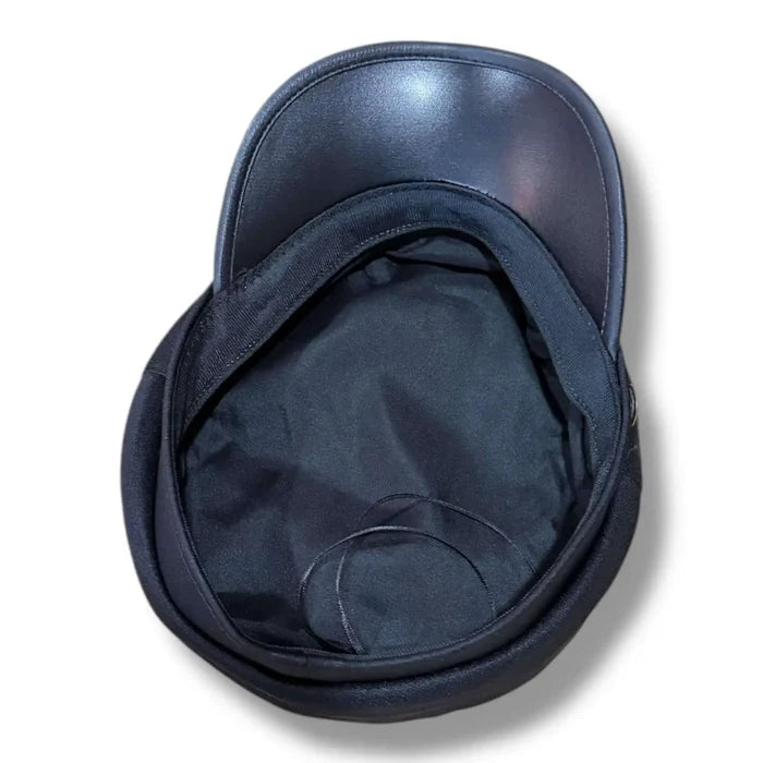 Two Tone Cotton Flat Top Fisherman Cap black faux leather curved brim, and gold button band upside down black.