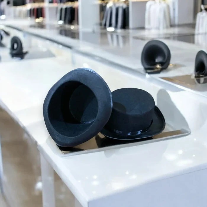 Victorian Black Felt Top Hat with stiff brim, satin hatband, faux leather trim, and flat-top crown