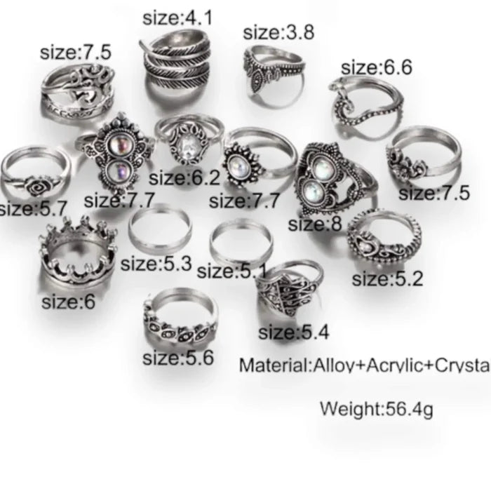 Vintage silver boho stacking rings set with 14 symbolic bands, blue faux stones and knuckle designs