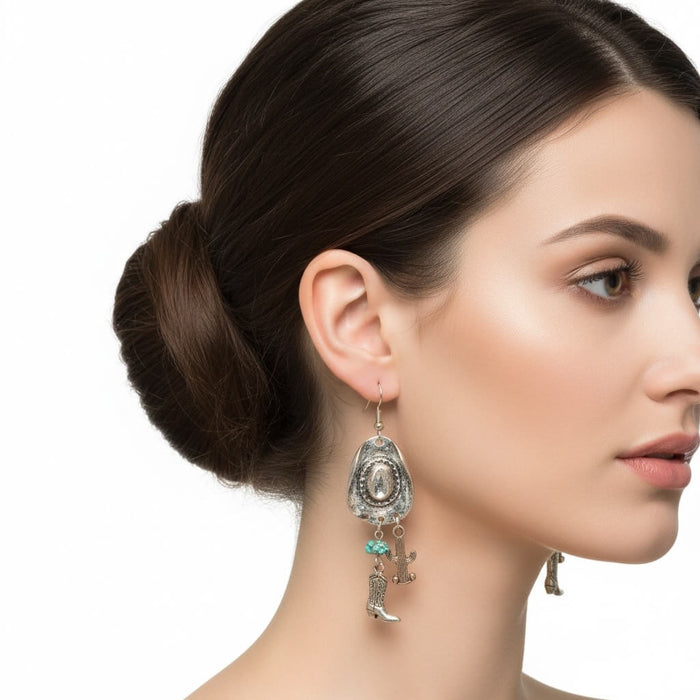Woman wearing left view Vintage Silver Cowboy Hat Charm Dangle Earrings with turquoise accents and boot charms women's / Osfm