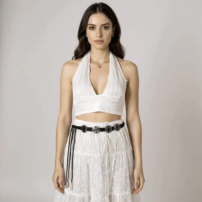 woman wearing the black and silver Vintage Western Tassel Concho Belt with faux suede wrap ties and movable medallions / one size