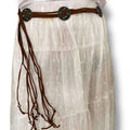 woman wearing the brown and brass Vintage Western Tassel Concho Belt with faux suede wrap ties and movable medallions / one size