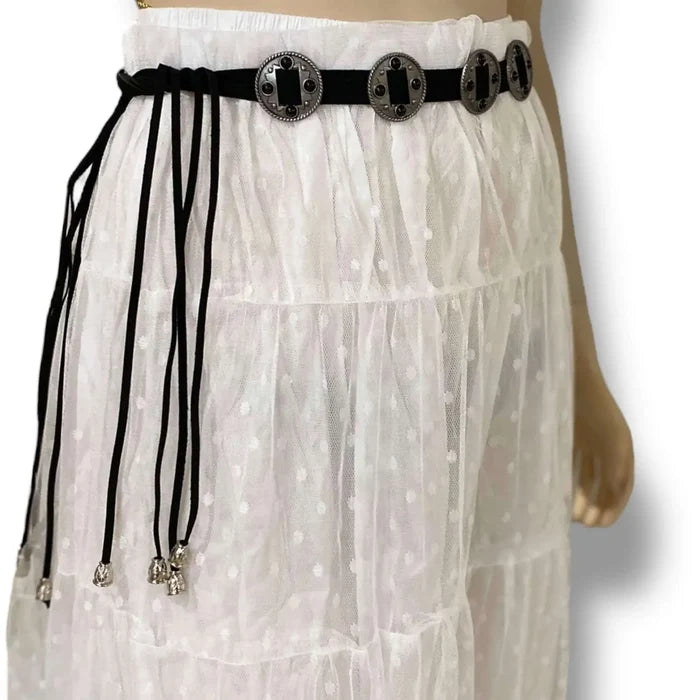 woman wearing the black and silver Vintage Western Tassel Concho Belt with faux suede wrap ties and movable medallions / one size