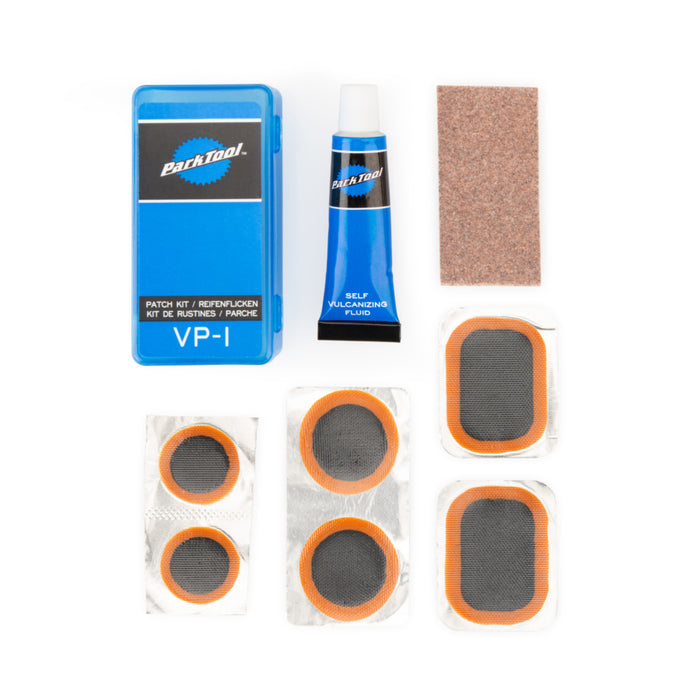 Park Tool bicycle repair kit with various components on a white background