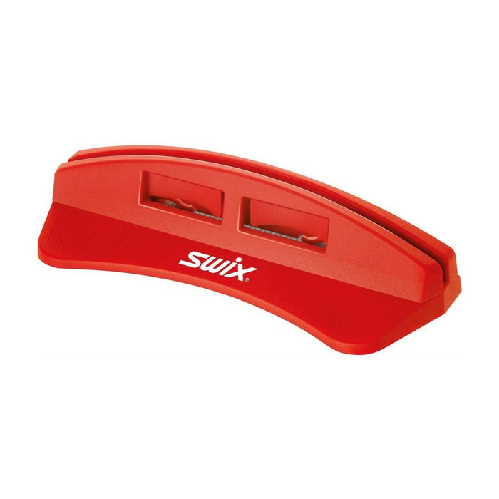 Red ski wax removal tool with 'Swix' branding on a white background