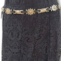 Western Black Leather Silver Sunburst Skinny Belt with silver sunburst concho links and faux leather strap detailed buckle design