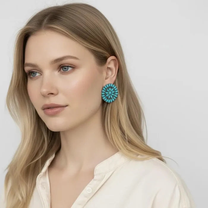 Western Turquoise Cluster Earrings worn by a model, showcasing a bold Southwest-inspired style with turquoise stones.