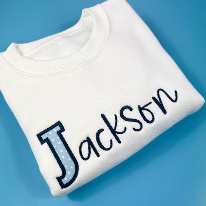 White Applique Jumper with Baby Blue Star Design