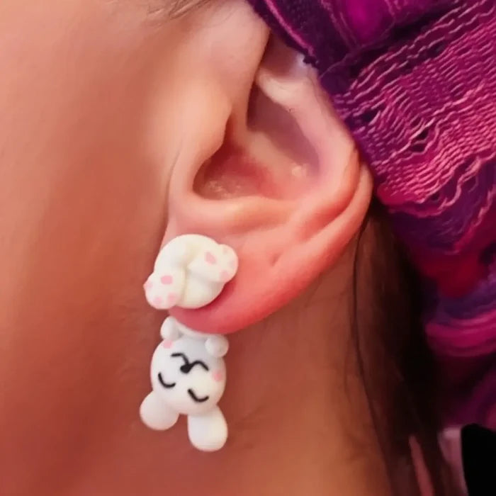Woman wearing White Bunny Kawaii Stud Earrings with pink paws and playful polymer clay style one size