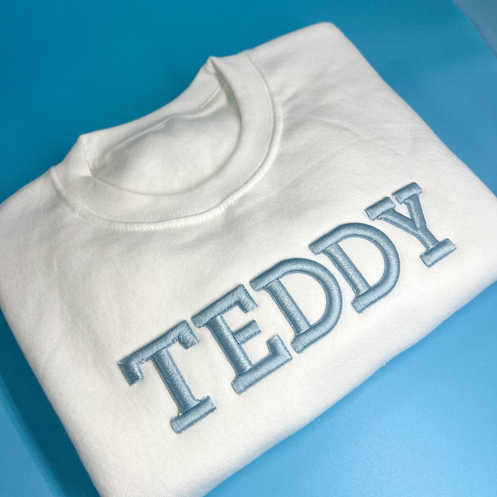 White Jumper with Blue 3D Font Jumper