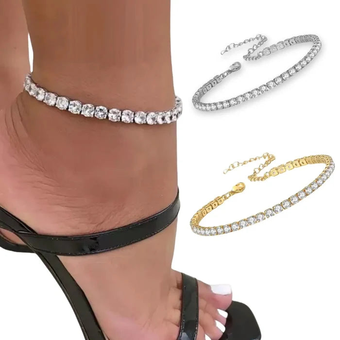 White Square Crystal Tennis Anklet shown in silver and gold settings on a model's ankle.