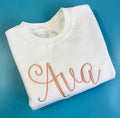 White Sweatshirt with Peach Font