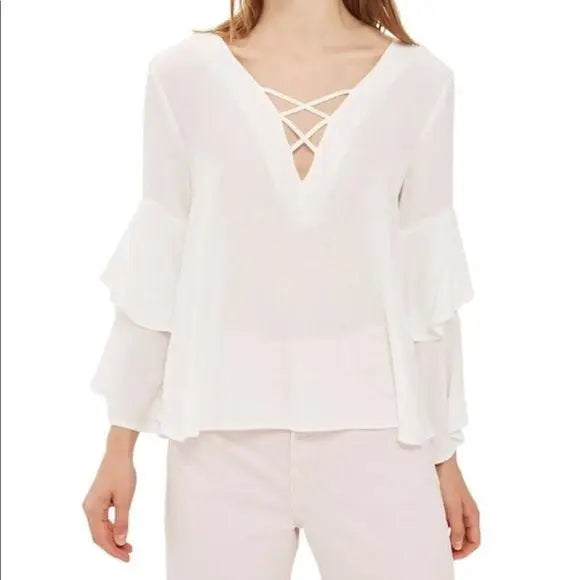 White V-neck long sleeve tiered blouse with ruffle sleeves and crisscross back detail size 4