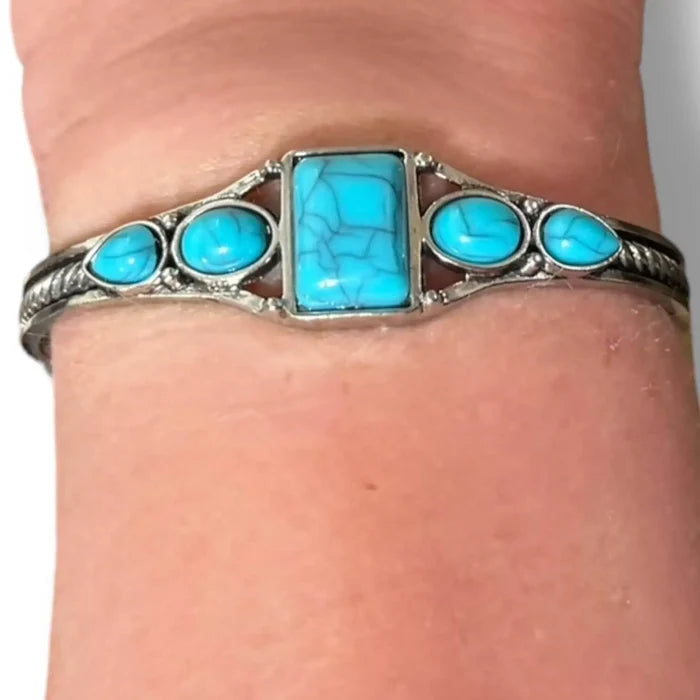 Wild West silver turquoise cuff bracelet with five faux turquoise cabochons in mixed shapes, antique silver braided band, adjustable southwestern boho cowgirl jewelry