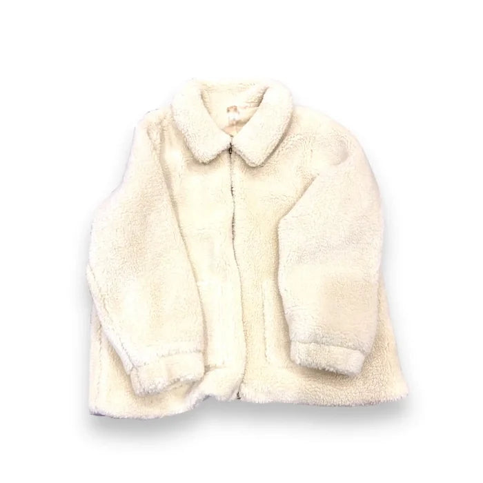 flat lay of bomber faux fur sherpa winter coat white background