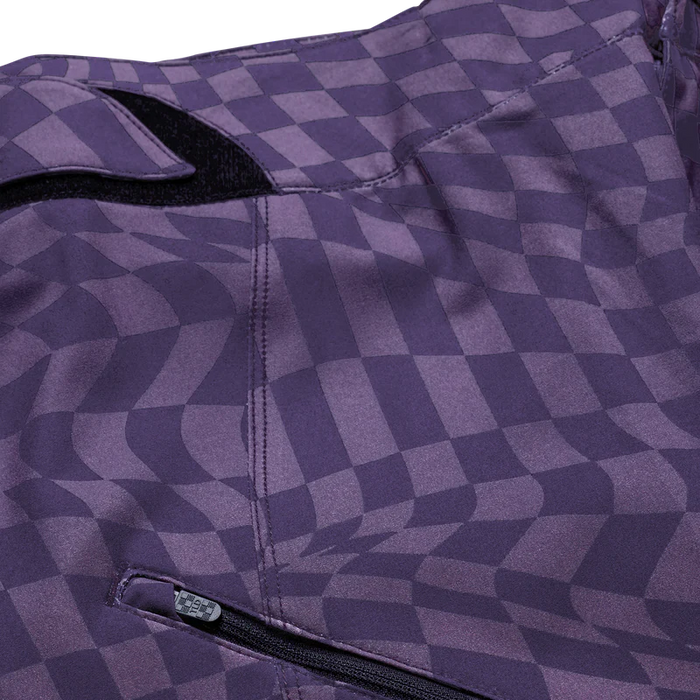 Close-up of a purple checkered jacket with a zipper detail on a white background